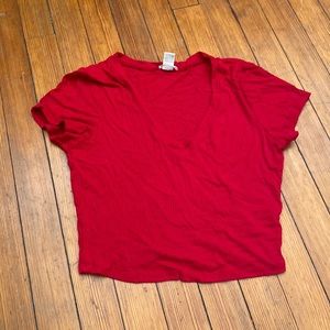 super cute v-neck crop! has been worn a few times and is a nice material!